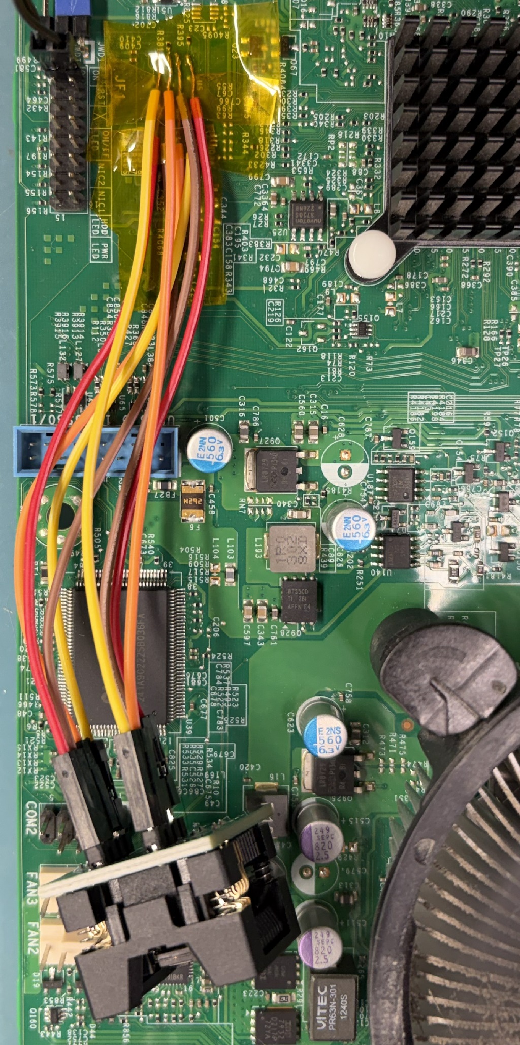 Vicinity of the motherboard PCB around the flash chip